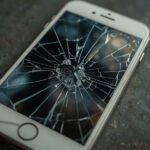 Lucid_Realism_a_smartphone_with_a_cracked_and_shattered_screen_0